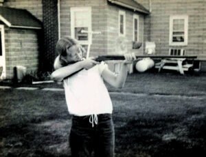 College girlfriend Kim Klein learning how to shotgun.